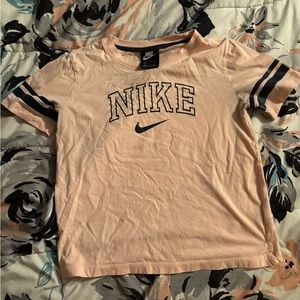 Pale pink nike shirt